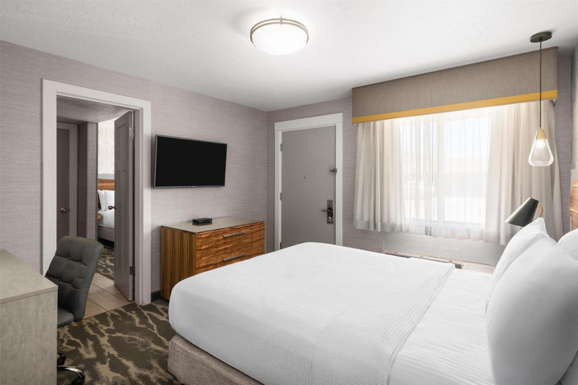 Zimmer mit Queensize-Bett und 2 Schlafzimmern